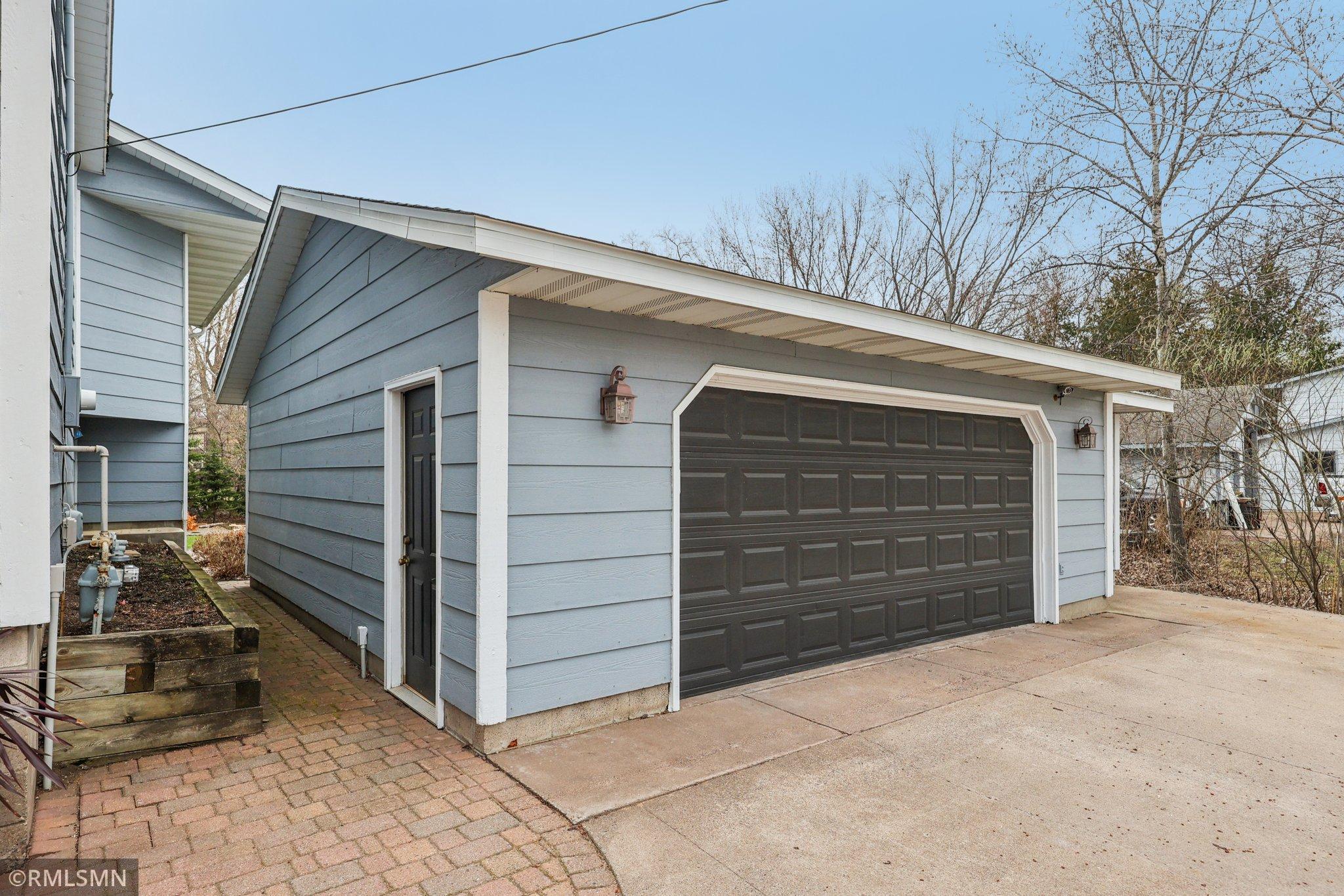 Large 3-car detached garage, but close to this entryway!