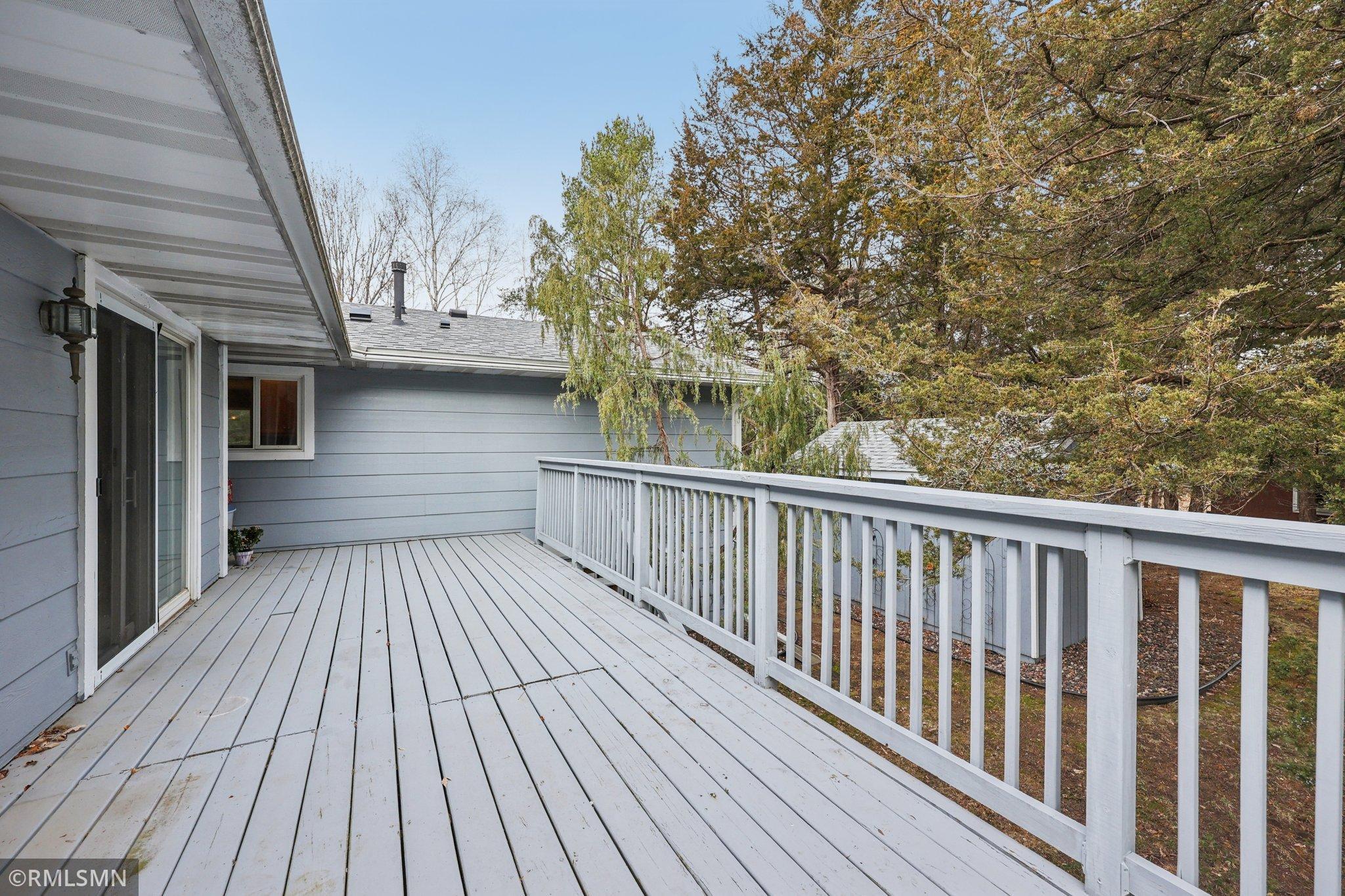 Large deck walks down to the backyard. It hasn't had a bath yet this spring.