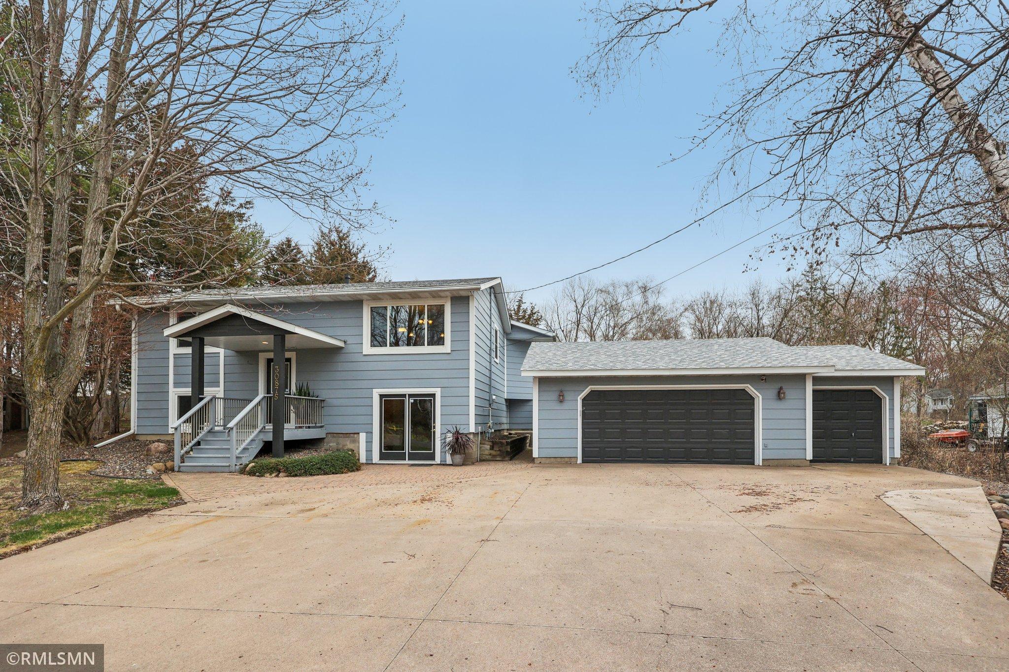 Large concrete and paver driveway