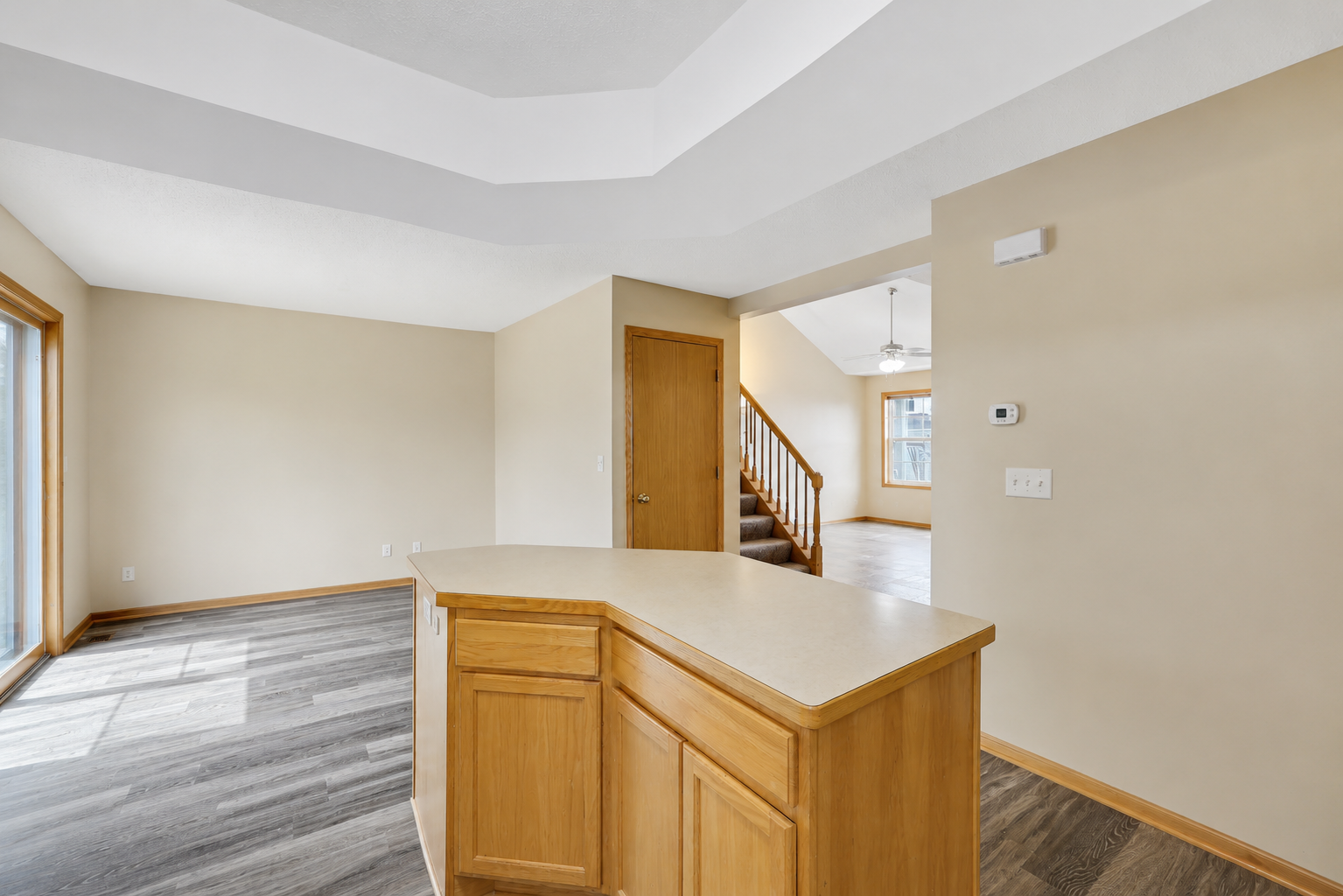 Open to the dining area and kitchen for constant connection.