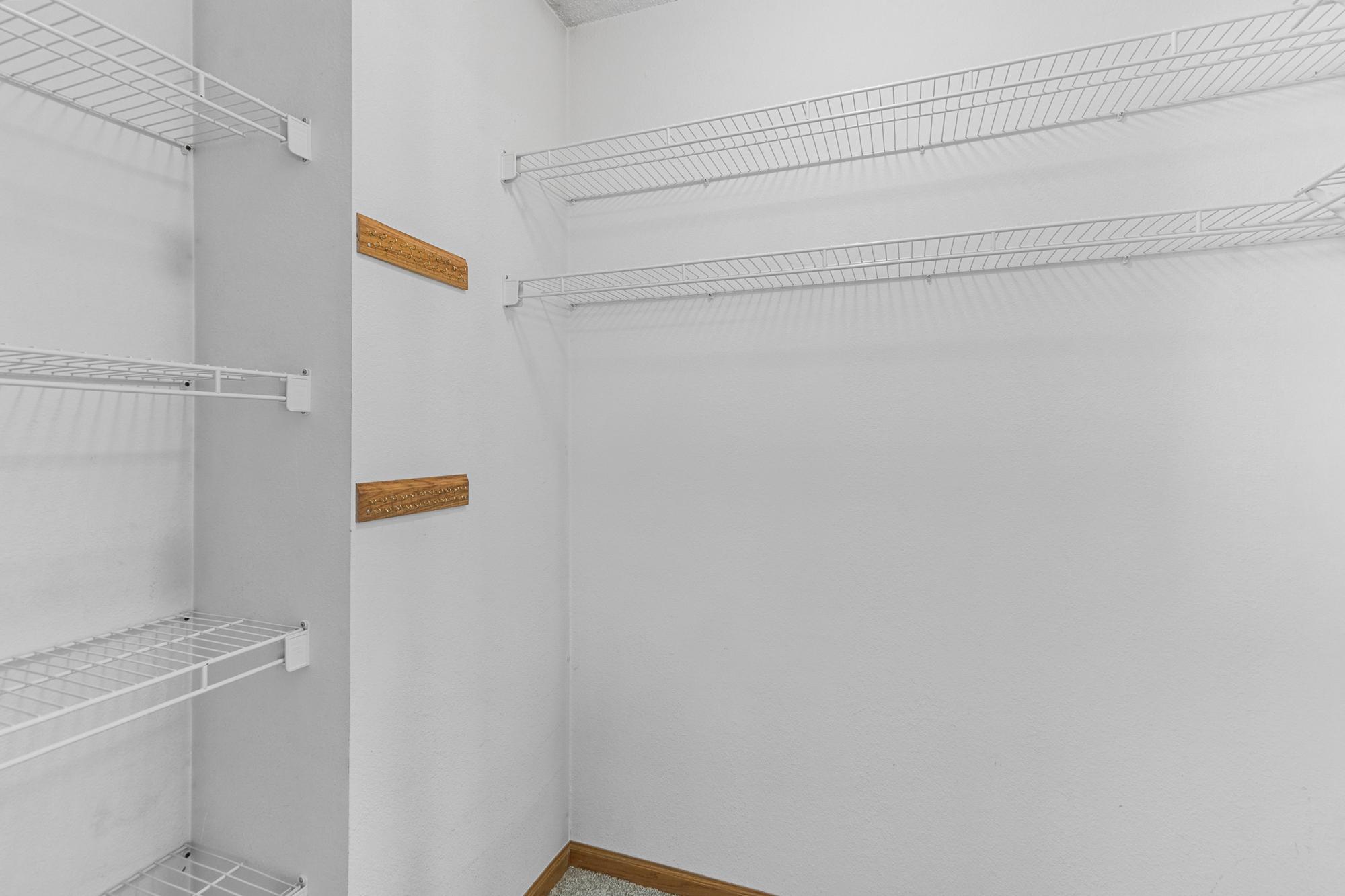 The primary walk-in closet. Room for all your clothes!
