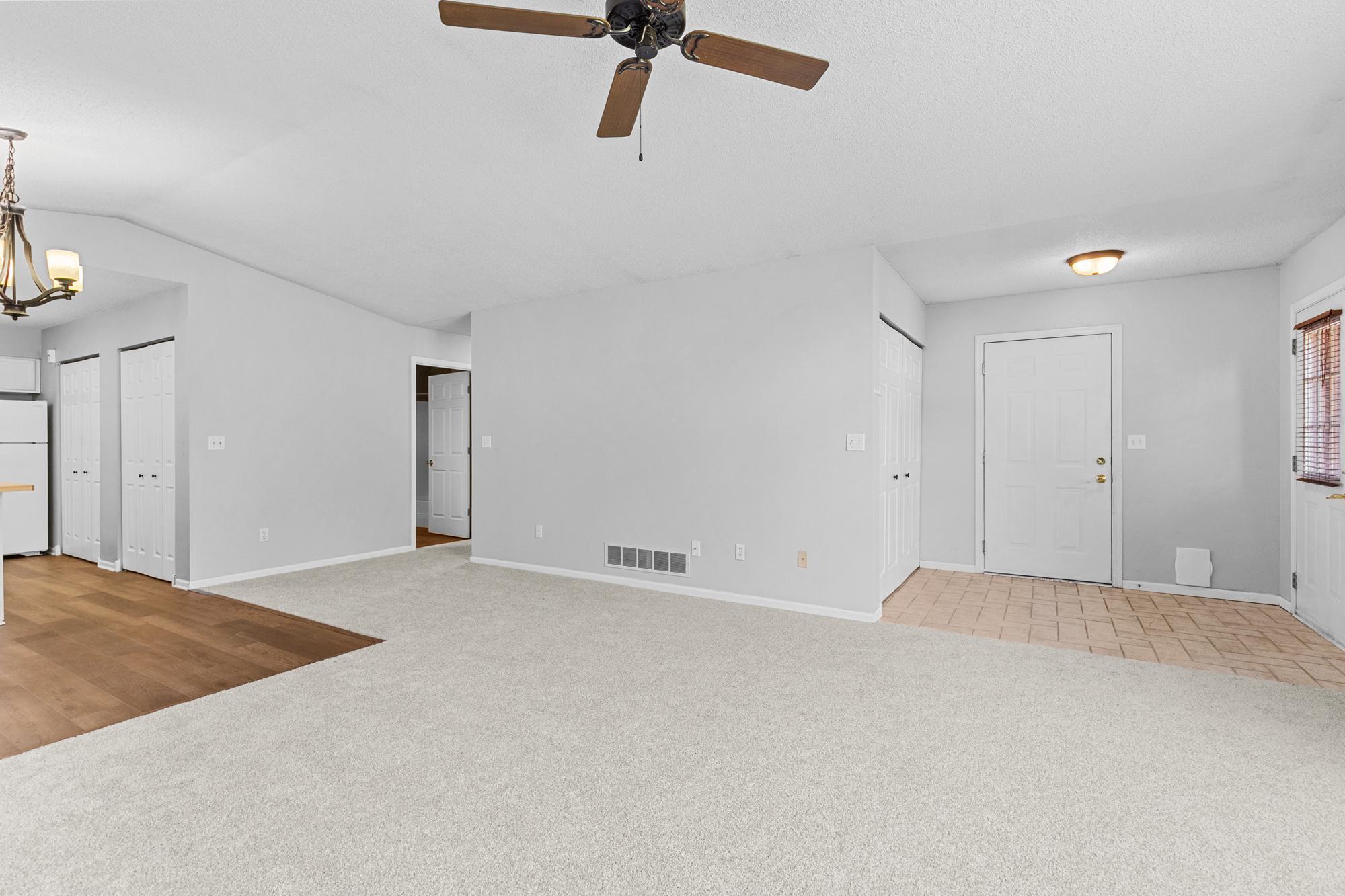 Spacious foyer with a large hall closet. New flooring.