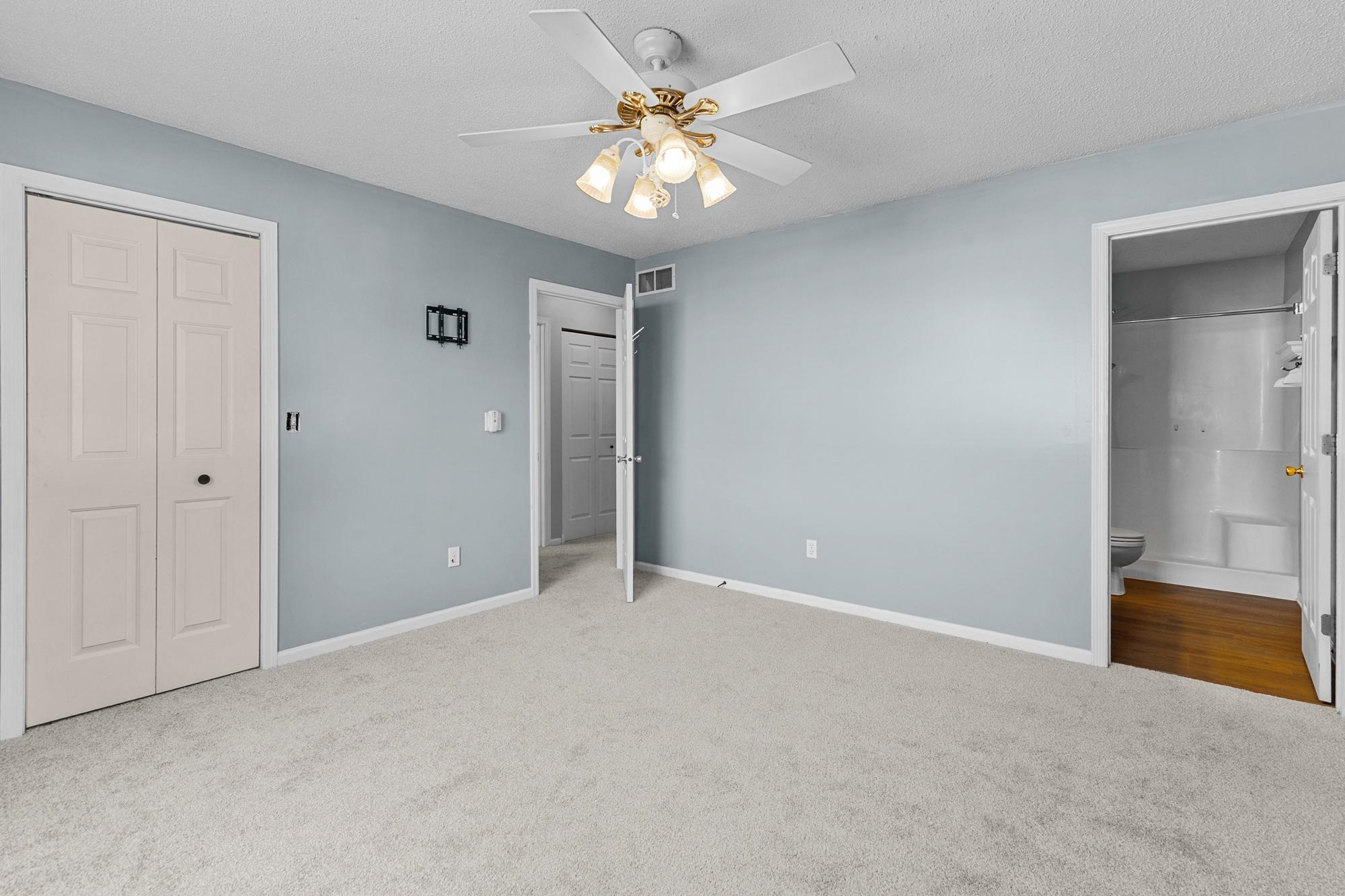 New carpet, paint in the primary bedroom. Private 3/4 bath attached.