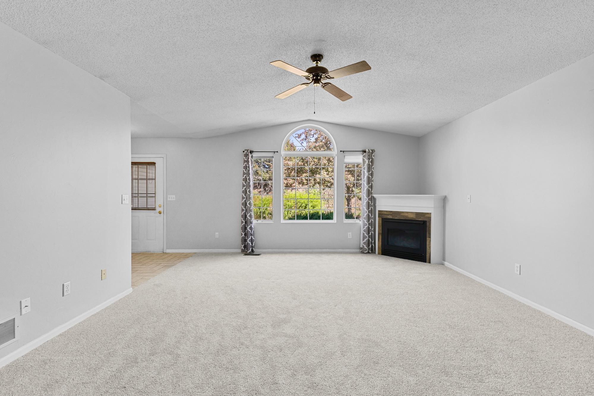 The living room with a gas fireplace.