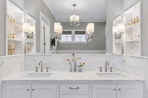 Spa like bath with ample counter and cabinet space