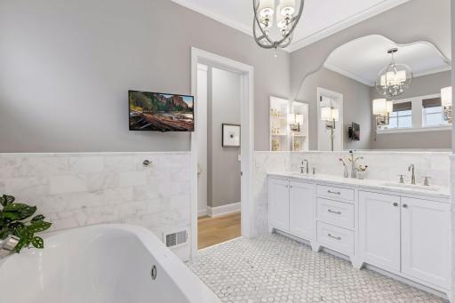Relax and unwind in this bathroom - direct access to the walk-in closet