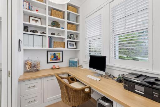 Designated main floor office space nestled between the main floor laundry and entryway.
