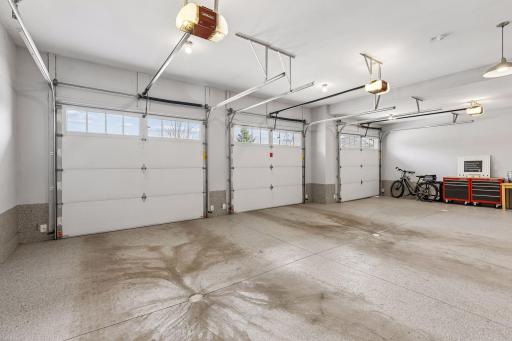 Spacious 3-car garage with room for storage