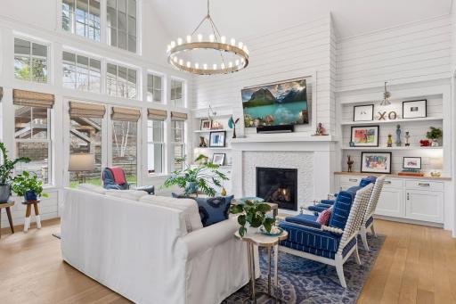 Light-filled Great Room with soaring ceilings, expansive windows, and seamless connection to the outdoor living space