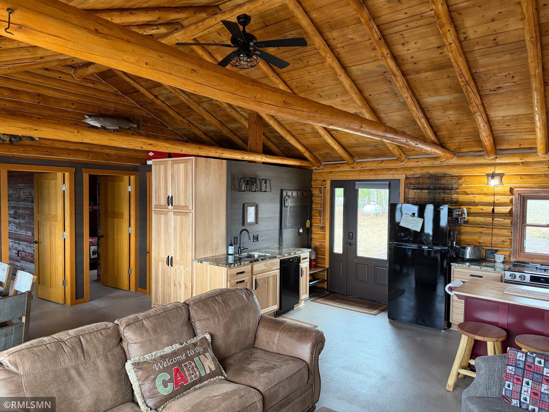 Hickory cabinets and granite countertops accent the kitchen