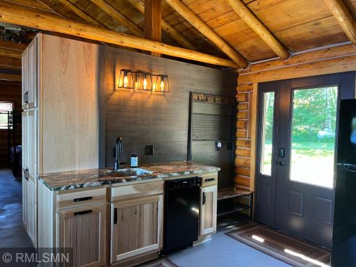 Kitchen sink, dishwasher and extra storage with pantry