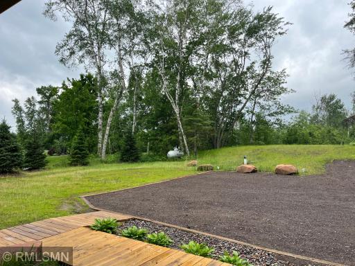 Driveway and parking area features crushed asphalt