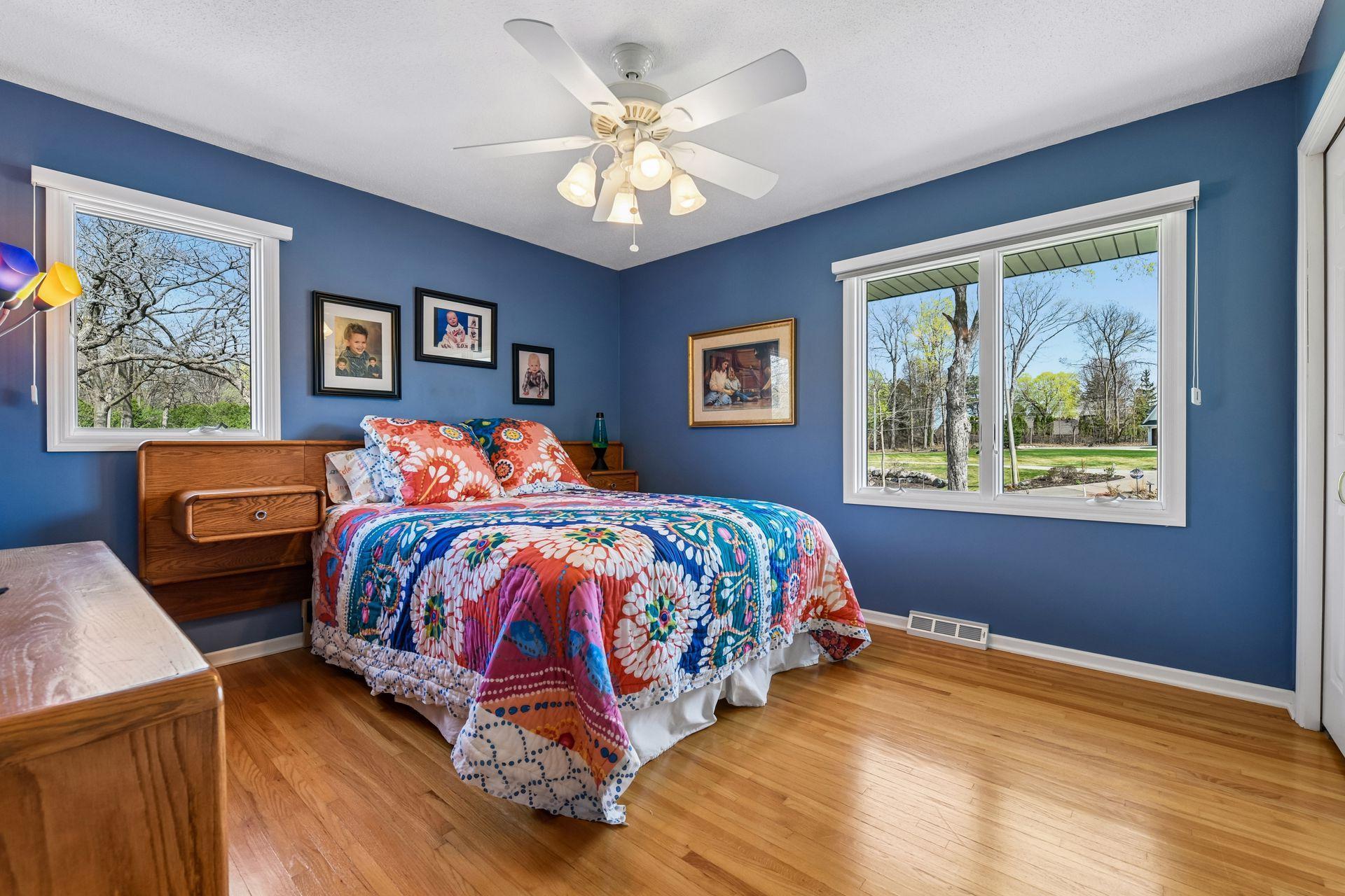 Second bedroom with oak hardwood floor