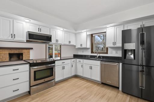Brand new kitchen with cabinets, granite countertops and SS appliances.