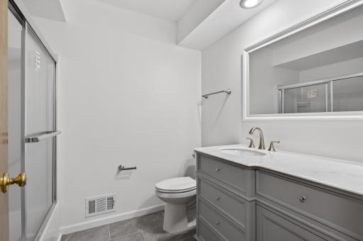 Remodeled full bathroom on the main level.