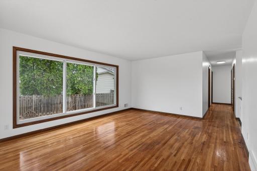 Another view of the living room with the gorgeous hardwood flooring.