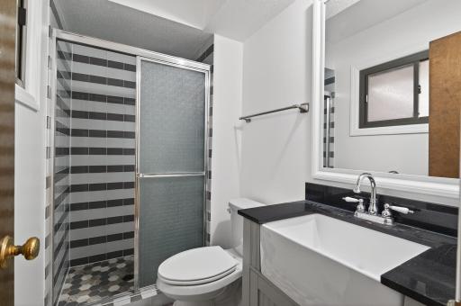 Updated primary 3/4 bath.