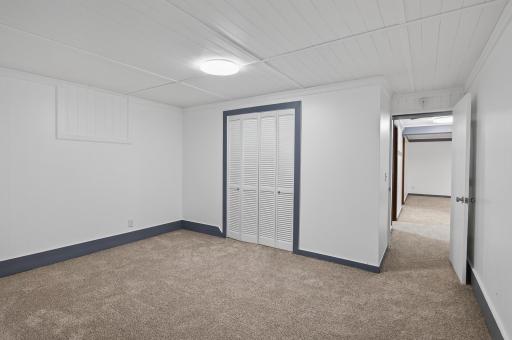 Another view of the bonus room on the lower level - perfect for a den, office, or potential fifth (non-conforming) bedroom.