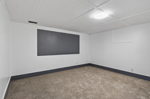 Bonus room on the lower level - perfect for a den, office, or potential fifth (non-conforming) bedroom.