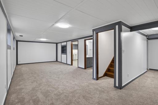 Lower level family room with brand new carpet.