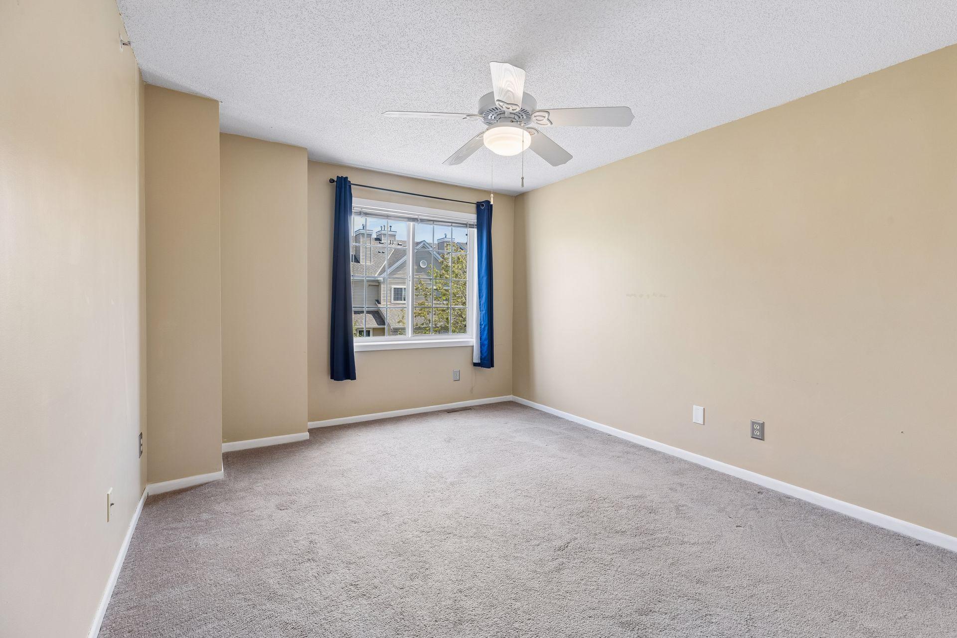 The 2nd bedroom also is light and bright with a large window.jpg