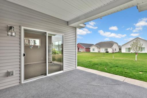 Back covered porch - sliding glass door to the sunroom