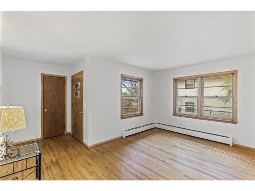 Unit 1 Home Entry into Living Room Hardwood Floors Throughout in Great Shape