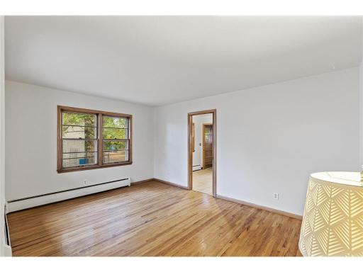 Unit 1 Living Room Tenants Will Love all the Windows and Natural Lighting