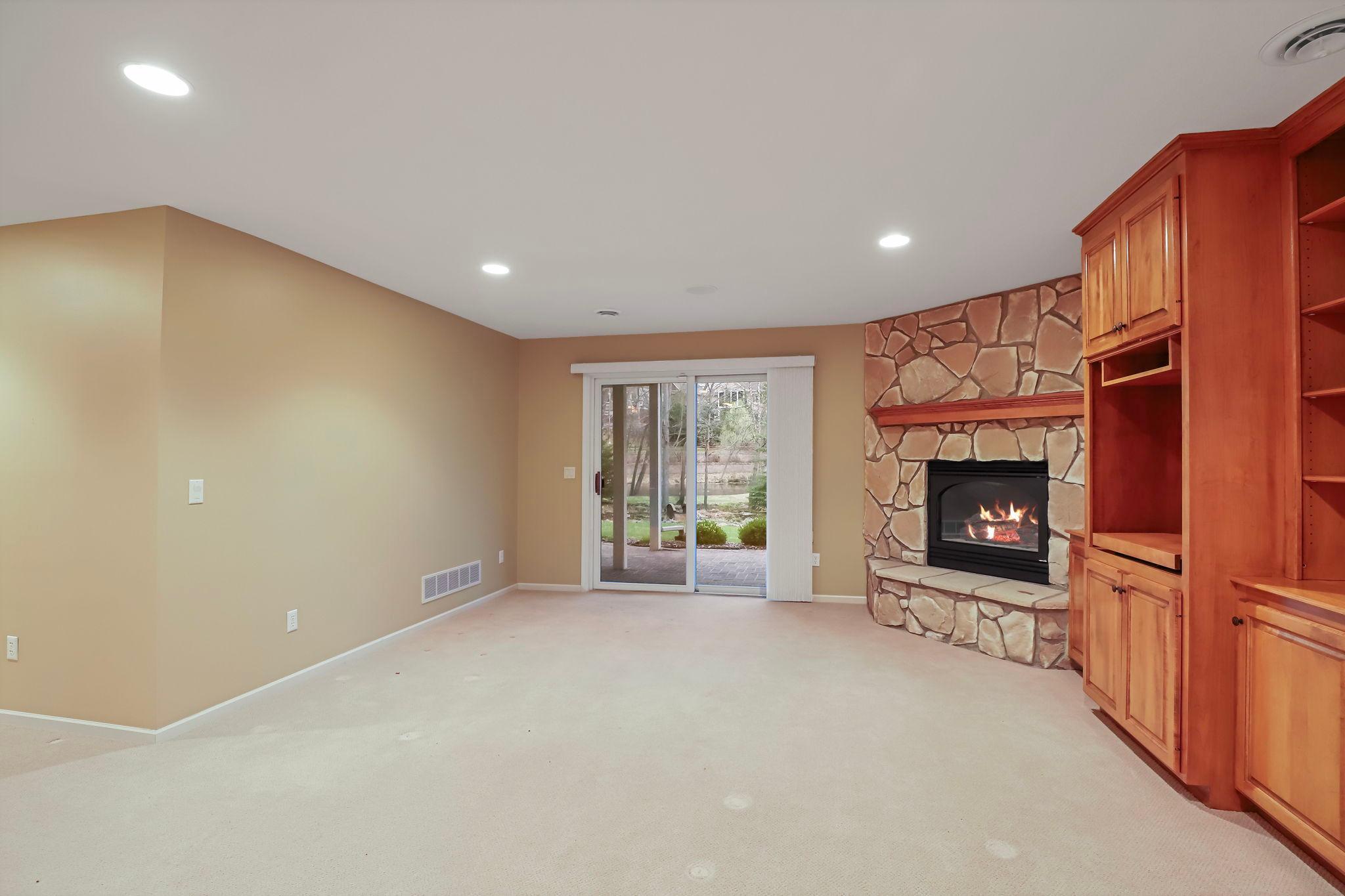 Walkout to covered paver patio.