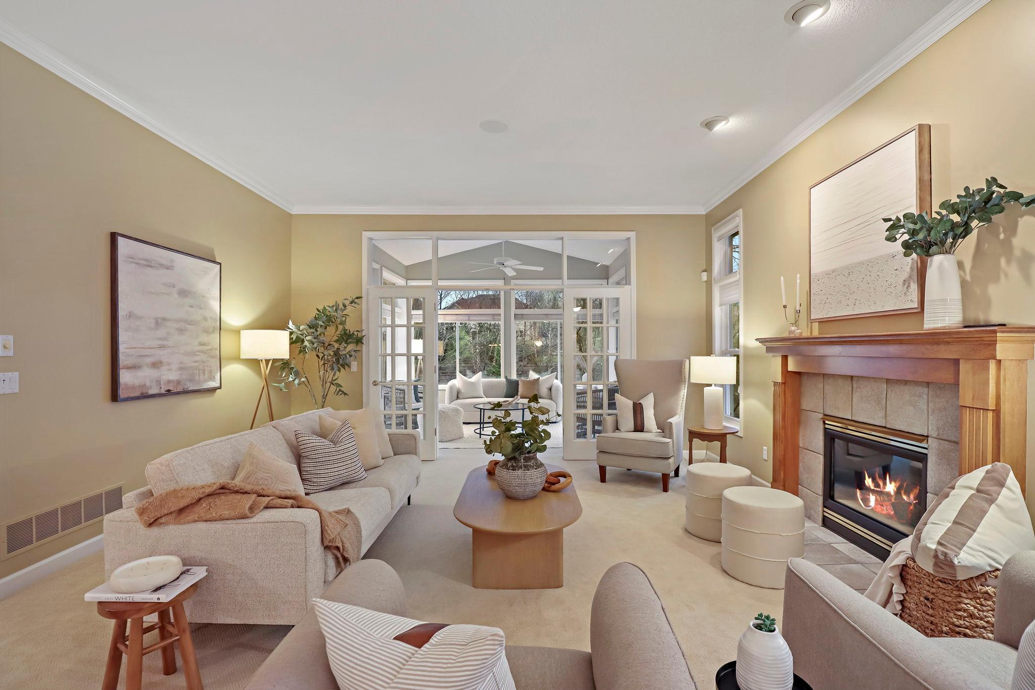 living room that leads to sun porch.