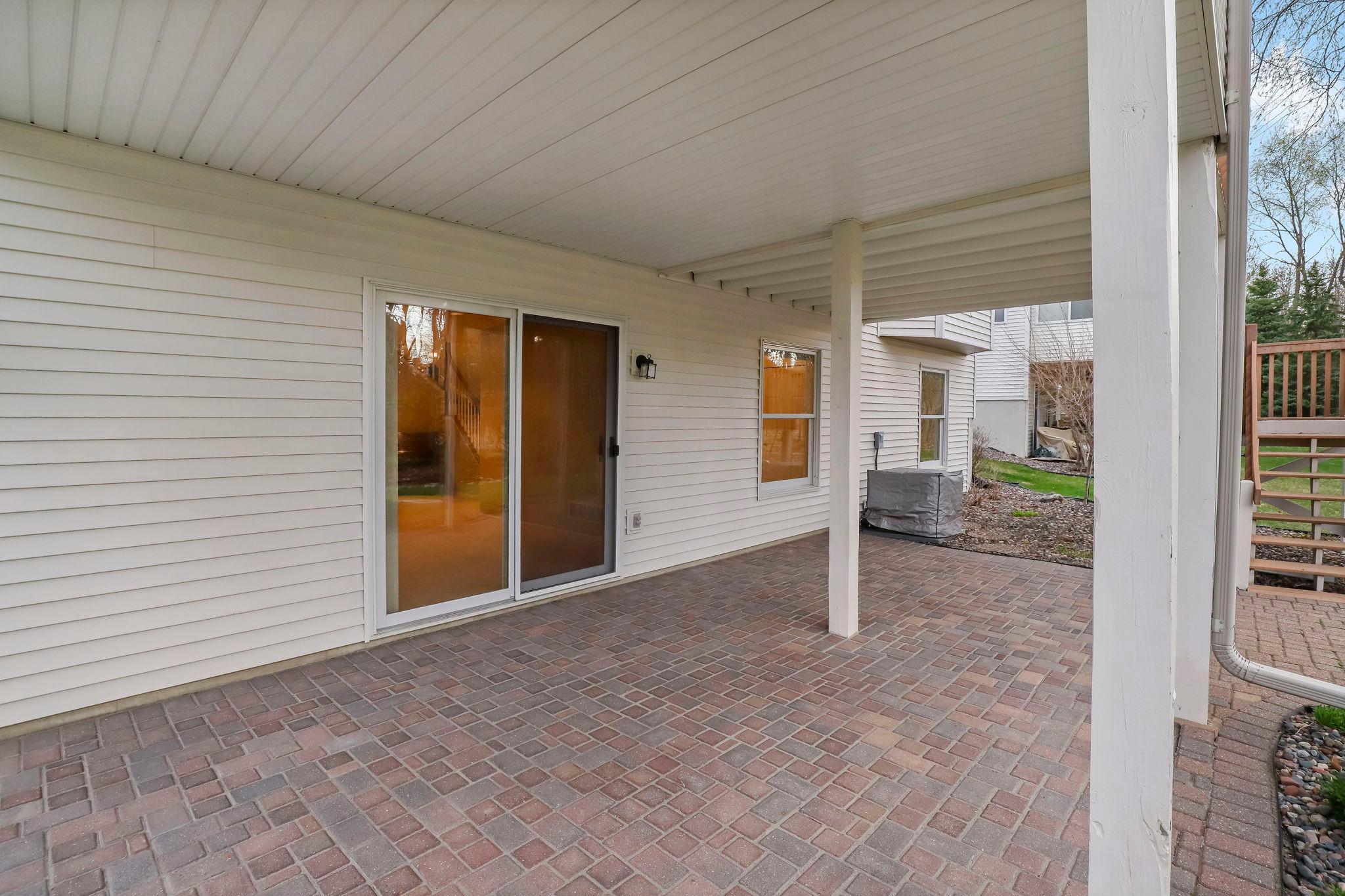 Covered paver patio of family room.