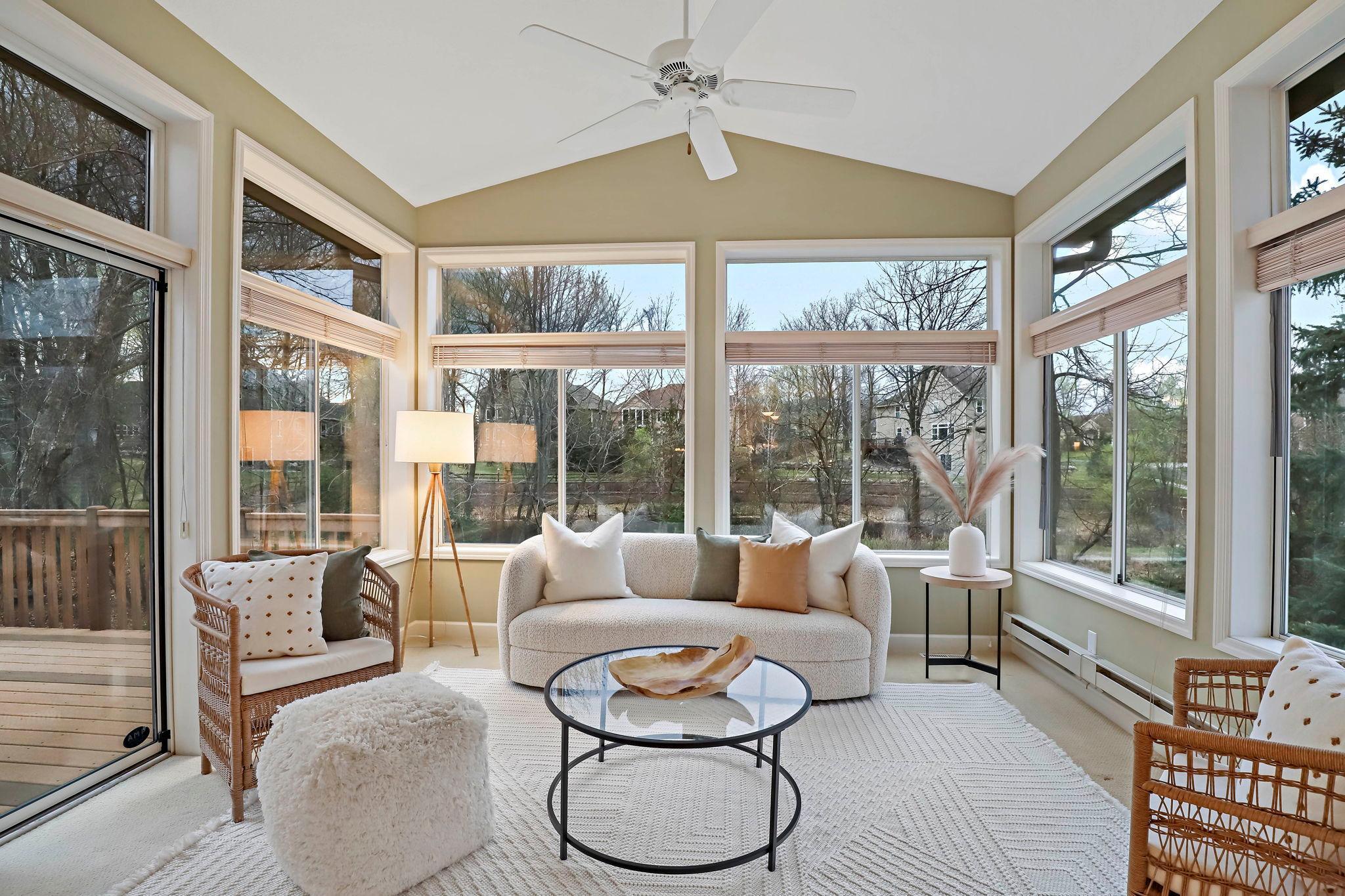 Sun porch over looking backyard pond and gardens.