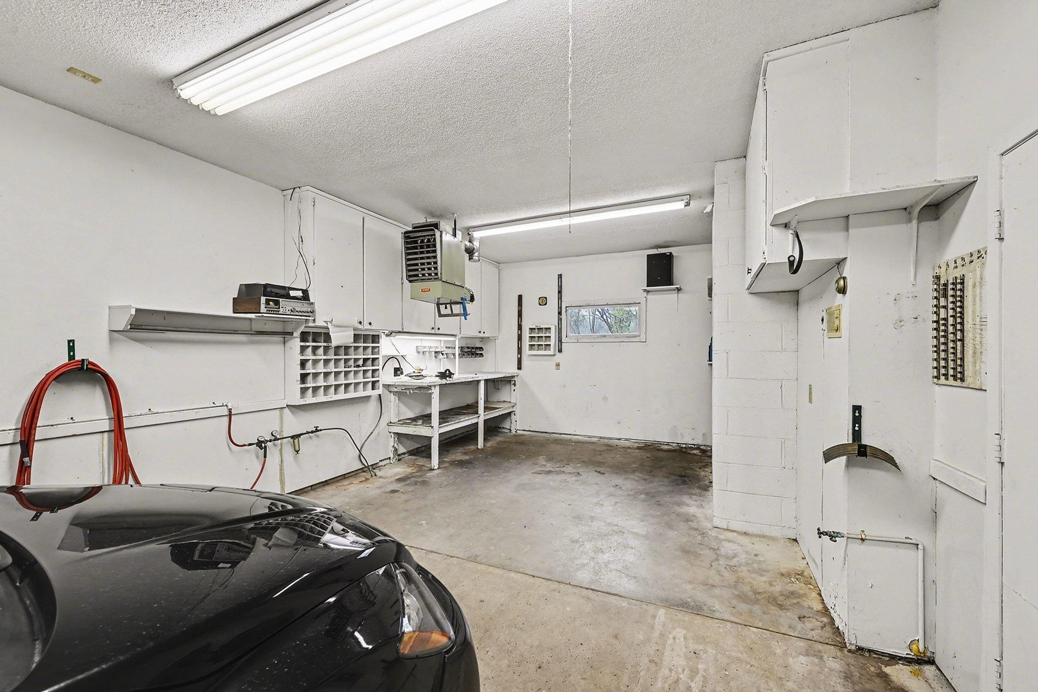 3rd stall fits car and has additional work space