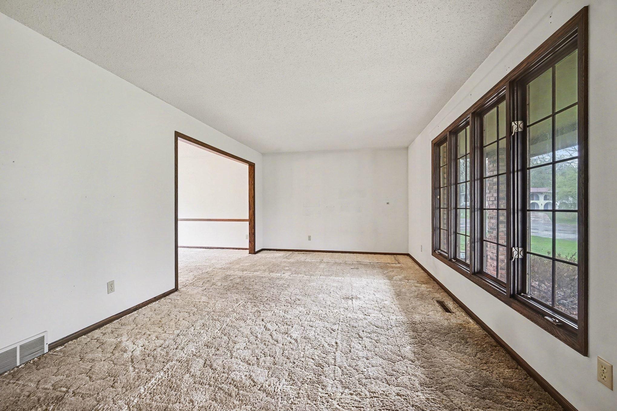 Living room flows into formal dining room