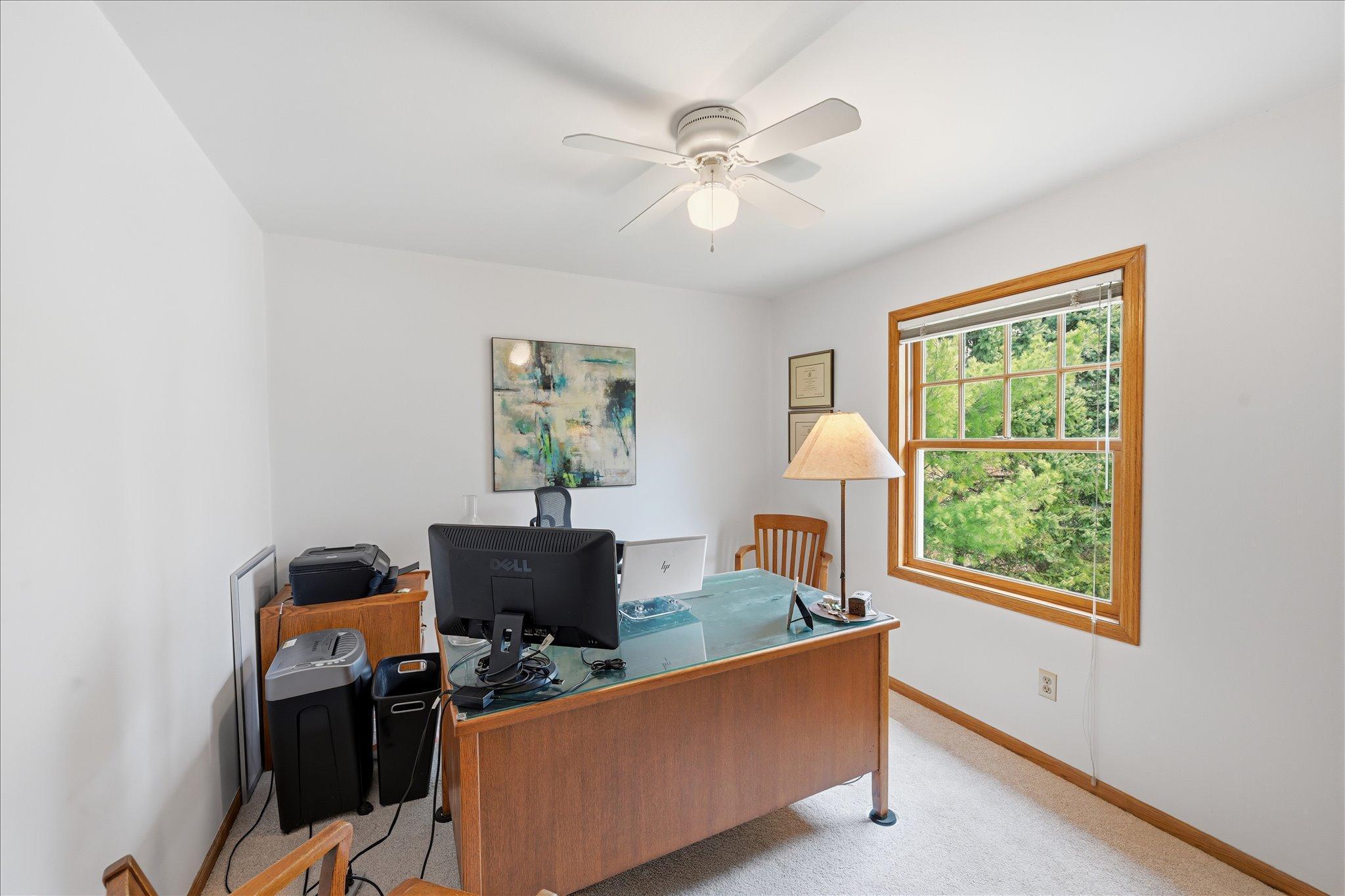 Bedroom #4 currently being used as an office.