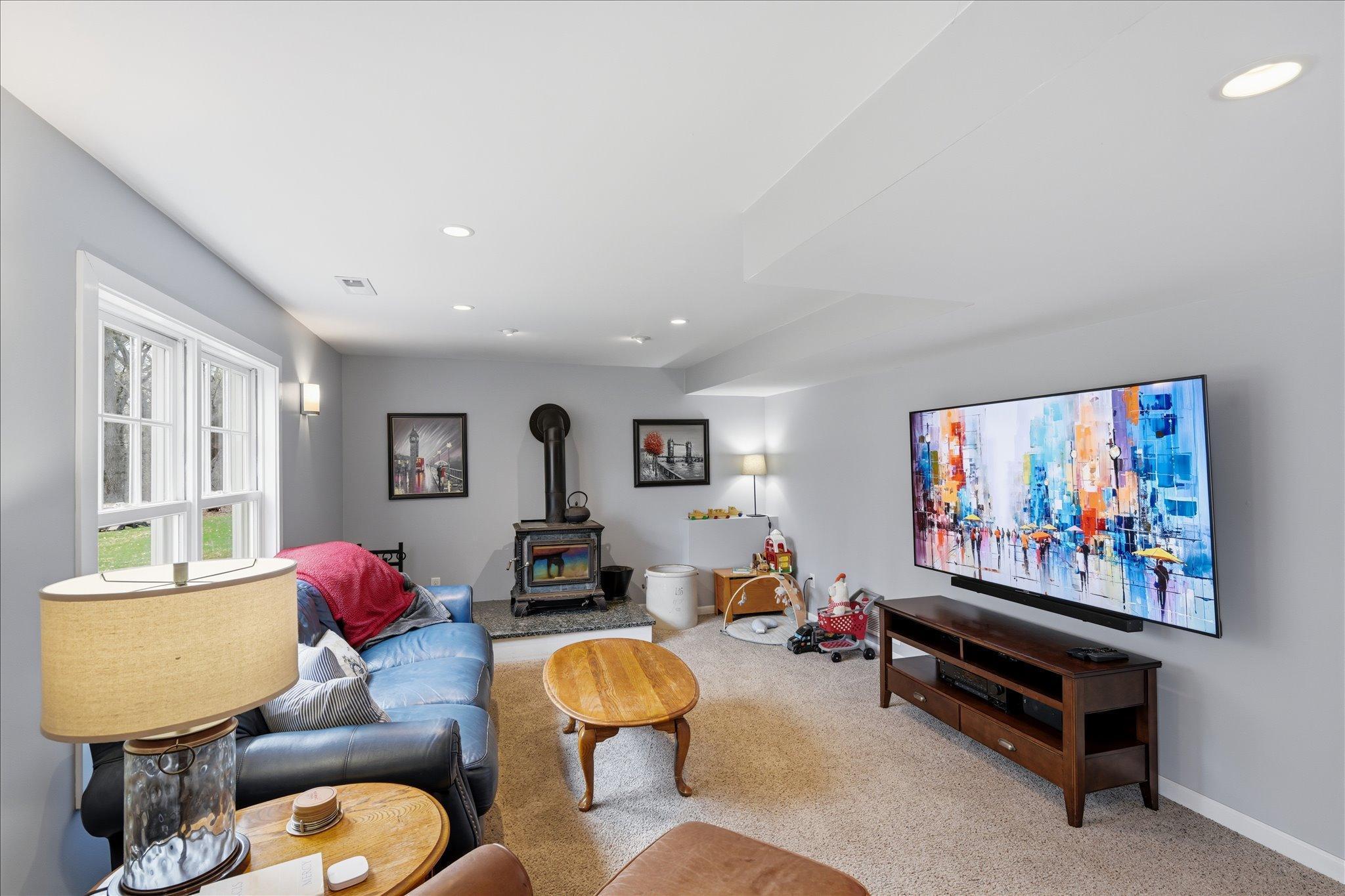 Windows and an abundance of canned lights so that you never feel like you are in a basement.