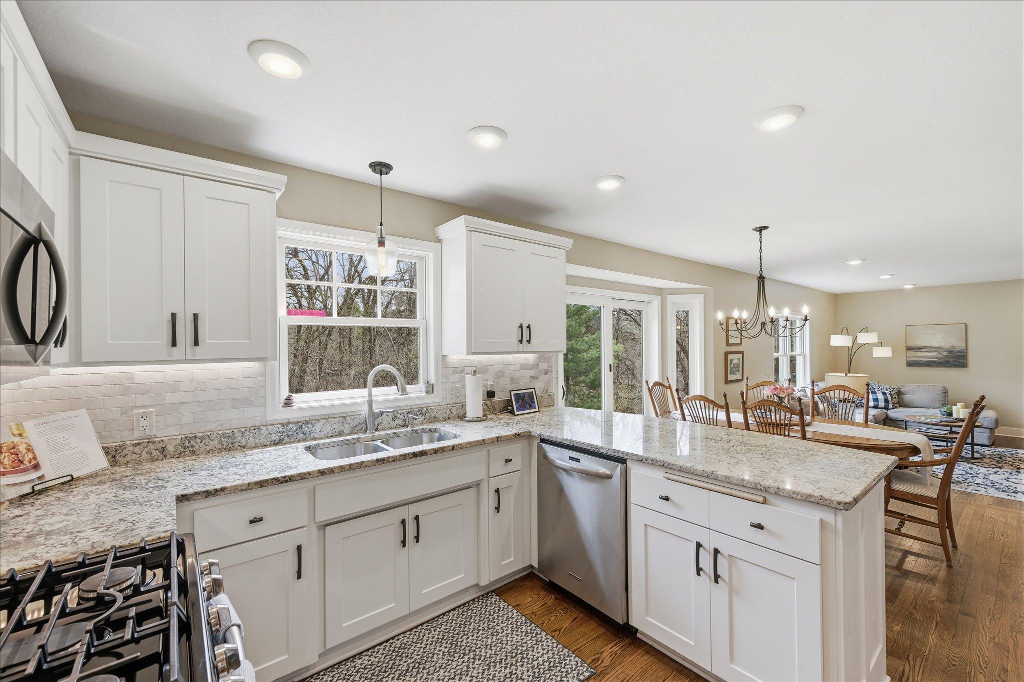 Updated with stainless steel appliances and granite countertops in hardwood floors!