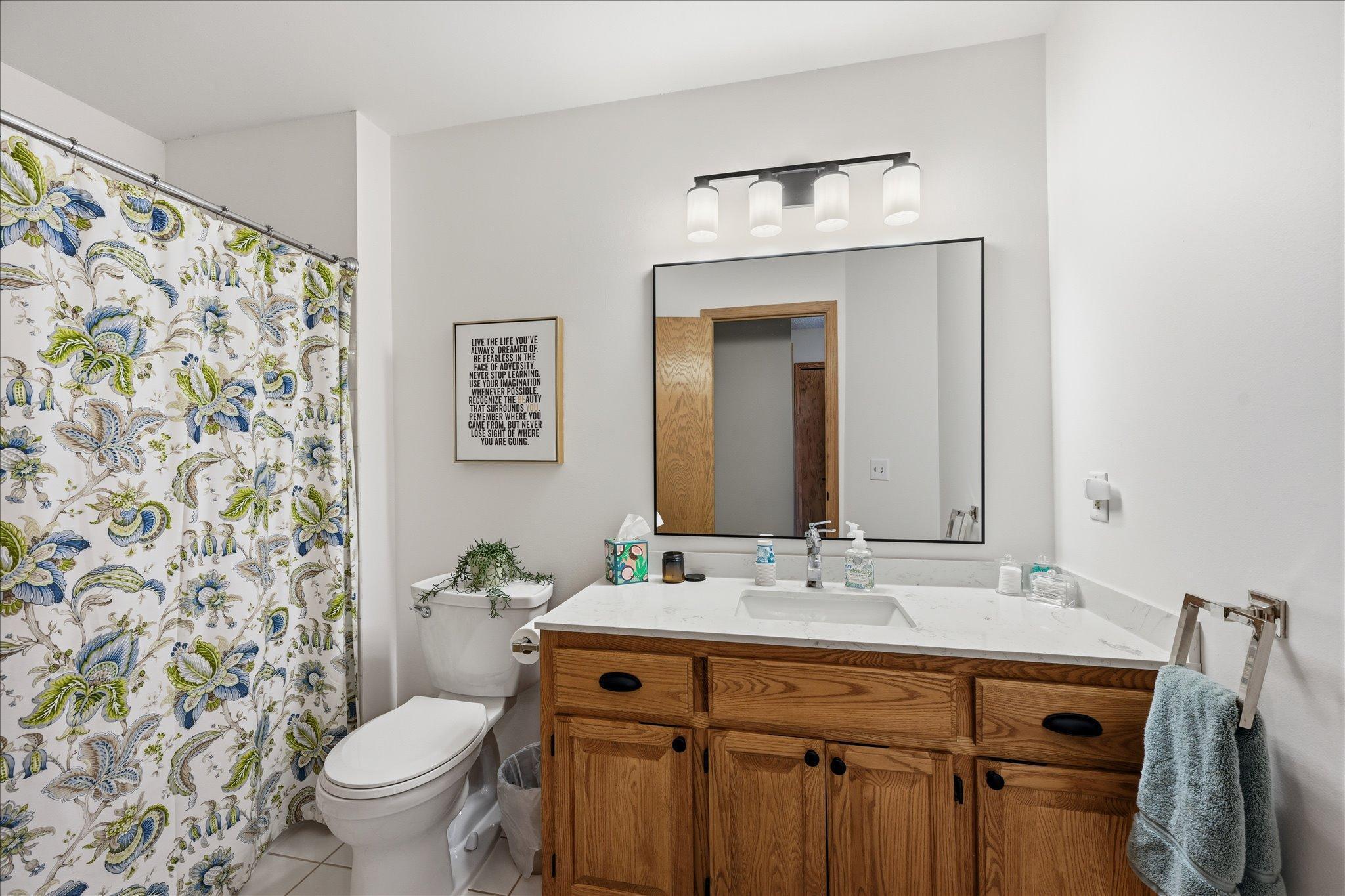 Hallway full bath which serves bedrooms #2 and #3.