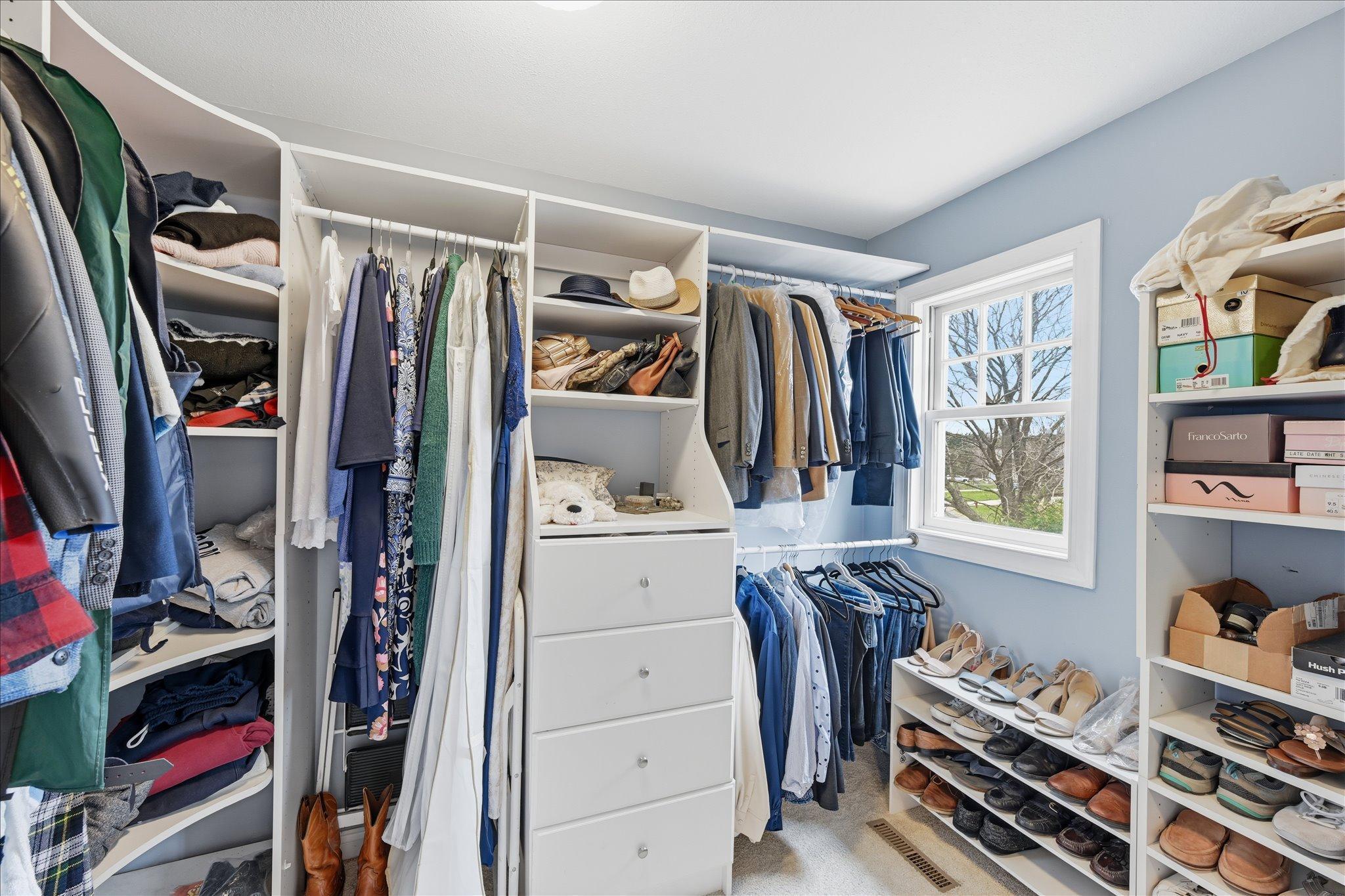 Luxurious light filled walk in closet!