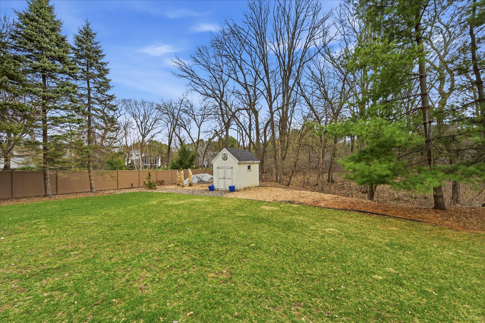 .495 acre lot which offers tons of privacy yet very centrally located!