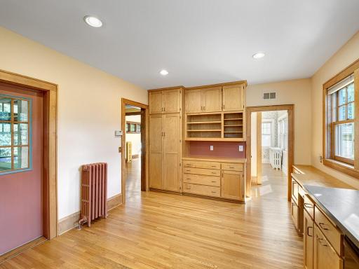 11 - Kitchen. So many cabinets and a built-in desk and closet.