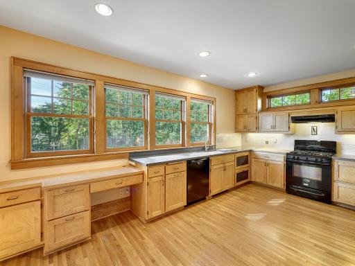 This is a true cook's kitchen. There's room for a large kitchen table or island and so many beautiful cabinets.