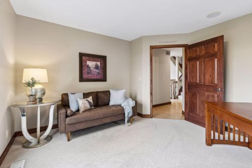 The expansive main level also features a private office space.