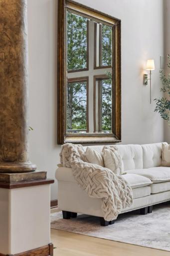 An extraordinary great room where soaring architecture and abundant natural light come together in perfect harmony.