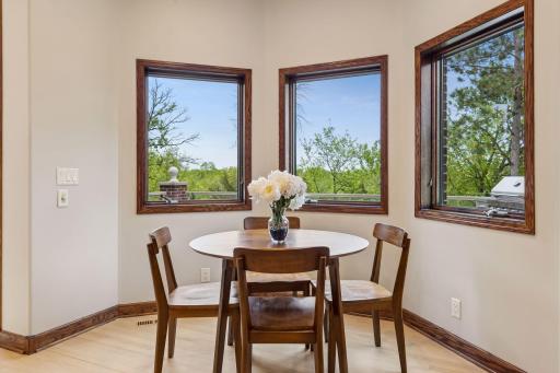 Enjoy morning coffee with a view in the sunlit breakfast area.