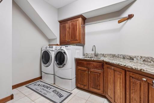 An upper-level laundry room adds everyday ease.