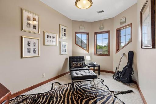 Unique architectural details and dramatic windows make this sophisticated flex space feel both elegant and inspiring.