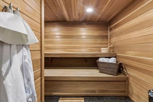 A private sauna transforms this luxurious bathroom into a spa-inspired retreat designed for relaxation, wellness, and everyday indulgence.