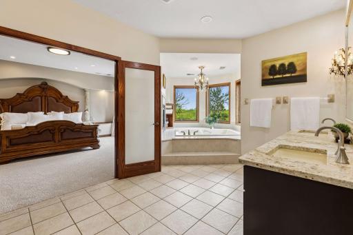A beautifully refined primary bathroom retreat.