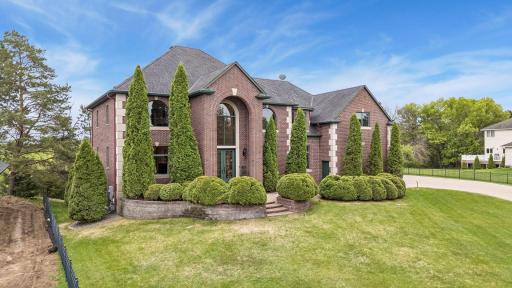 Nestled in the prestigious River Bluffs Estates neighborhood in Ramsey, Minnesota.